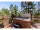 Hot tub on an outdoor deck with stunning views of the trees at 5414 Golden Currant Way, Parker, CO 80134