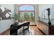 Inviting office with a large window, a modern desk, and ample natural light at 5414 Golden Currant Way, Parker, CO 80134