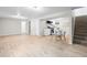 Finished basement with ample space and a staircase at 2260 S Lewiston St, Aurora, CO 80013