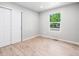 Bedroom with wood floors and ample natural light at 2260 S Lewiston St, Aurora, CO 80013