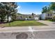Charming single-Gathering home with a stone facade, lush green lawn, and attached garage at 2260 S Lewiston St, Aurora, CO 80013