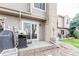 Back patio offers space for entertaining at 11147 W 17Th Ave # 103, Lakewood, CO 80215