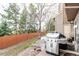 Fenced backyard with a grill at 11147 W 17Th Ave # 103, Lakewood, CO 80215