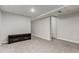 Spacious unfinished basement with neutral carpet and modern lighting at 11147 W 17Th Ave # 103, Lakewood, CO 80215