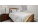 Cozy bedroom with natural light, a comfortable bed, and bedside tables at 11147 W 17Th Ave # 103, Lakewood, CO 80215
