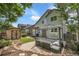 Inviting backyard with a cozy seating area, lush lawn, and storage shed perfect for outdoor relaxation at 11355 Haswell Dr, Parker, CO 80134