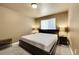 Bedroom with neutral colors, carpeted floors and two side tables with lamps at 11355 Haswell Dr, Parker, CO 80134