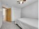 Bedroom featuring carpet, white walls, and a closet with bifold doors at 11355 Haswell Dr, Parker, CO 80134