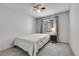 Bedroom with neutral colored walls, ceiling fan and carpeted floors at 11355 Haswell Dr, Parker, CO 80134