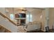 Comfortable living room with fireplace, mantel, large television, and plenty of natural light at 11355 Haswell Dr, Parker, CO 80134