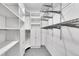 Spacious walk-in closet with built-in shelving and ample storage space at 11355 Haswell Dr, Parker, CO 80134