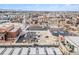 Aerial view of a city neighborhood with various houses and buildings at 2438 Welton St, Denver, CO 80205