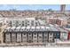 Aerial view of a row of townhouses in a city setting at 2438 Welton St, Denver, CO 80205