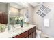 Double vanity bathroom with a large walk-in shower at 2438 Welton St, Denver, CO 80205