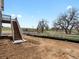Unfinished backyard with staircase access and golf course view at 1975 S Coolidge Way, Aurora, CO 80018