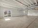 Unfinished basement with sliding glass door at 1975 S Coolidge Way, Aurora, CO 80018