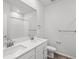 Bathroom with double sink vanity, large mirror, and toilet at 1975 S Coolidge Way, Aurora, CO 80018