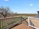 Expansive backyard view from the wood deck and white railing at 1975 S Coolidge Way, Aurora, CO 80018