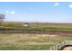 Scenic view showcasing expansive open field with golf carts in the distance at 1975 S Coolidge Way, Aurora, CO 80018