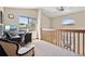 Bright office space with large windows and a built-in desk, ideal for working from home at 3838 S Waco St, Aurora, CO 80013