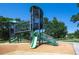 Community playground featuring modern climbing structures and slides at 3838 S Waco St, Aurora, CO 80013
