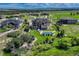 Aerial view of a luxury home with a swimming pool, lush landscaping, and a private backyard oasis at 7343 Upton Ct, Castle Rock, CO 80104