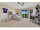 Comfortable bedroom with a neutral color scheme and balcony with a view at 7343 Upton Ct, Castle Rock, CO 80104