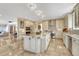 Spacious kitchen with a large center island, stainless steel appliances, and custom cabinetry at 7343 Upton Ct, Castle Rock, CO 80104