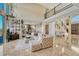Open floorplan view features a spacious living room and dining area with natural light at 7343 Upton Ct, Castle Rock, CO 80104