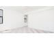 Spacious bedroom with plush carpeting, modern ceiling fan, and large windows providing ample natural light at 263 S Jackson St, Denver, CO 80209