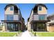 Contemporary townhomes with unique architectural design, featuring a metal roof, balconies, and covered entryways at 263 S Jackson St, Denver, CO 80209