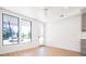 Bright living room with hardwood floors, modern windows and glass door at 263 S Jackson St, Denver, CO 80209