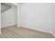 Foyer view leading to staircase with hardwood floors and neutral walls at 25022 E 34Th Pl, Aurora, CO 80019