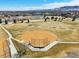 Aerial view of baseball field, showing open space with baseball diamond and scenic views at 7081 Salvia St, Arvada, CO 80007