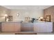 Basement featuring built in countertops, cabinets and drawers with pink and grey tones at 7081 Salvia St, Arvada, CO 80007