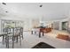 Finished basement with a foosball table and a walkout to the backyard at 7081 Salvia St, Arvada, CO 80007