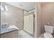 Bathroom featuring a shower and vanity at 7081 Salvia St, Arvada, CO 80007