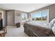 Bedroom featuring two large windows with mountain views at 7081 Salvia St, Arvada, CO 80007