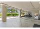 Covered patio with a BBQ grill and an outdoor dining set overlooking a backyard at 7081 Salvia St, Arvada, CO 80007