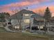 Expansive backyard with multi-tiered deck, ideal for outdoor entertaining and relaxation at 7081 Salvia St, Arvada, CO 80007