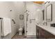Elegant bathroom with a glass enclosed shower, modern fixtures, and wood accents at 80 Spruce Ct, Evergreen, CO 80439