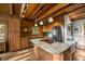 Well-equipped kitchen with granite countertops, stainless steel appliances, and hardwood floors at 80 Spruce Ct, Evergreen, CO 80439