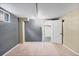 Spacious finished basement with neutral carpet and ample lighting at 766 Monroe St, Denver, CO 80206