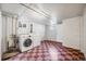 Functional basement laundry area with washer and dryer hookups at 766 Monroe St, Denver, CO 80206