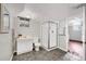 Basement bathroom featuring a standalone shower and large vanity at 766 Monroe St, Denver, CO 80206