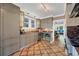 Well-equipped kitchen with stainless steel appliances, ample storage, and seamless flow into dining area at 766 Monroe St, Denver, CO 80206
