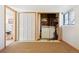 Spacious basement laundry room featuring a washer, dryer, and storage at 9655 W 105Th Way, Broomfield, CO 80021