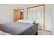 Cozy bedroom with plush carpets, closet, and natural light at 9655 W 105Th Way, Broomfield, CO 80021