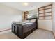 Bedroom featuring built-in shelves, drawers, and natural light at 9655 W 105Th Way, Broomfield, CO 80021