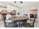Dining area features a stylish table set and an open layout next to the kitchen at 9655 W 105Th Way, Broomfield, CO 80021